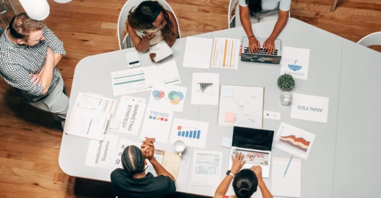 Business Innovation - People in the Office Discussing a Project