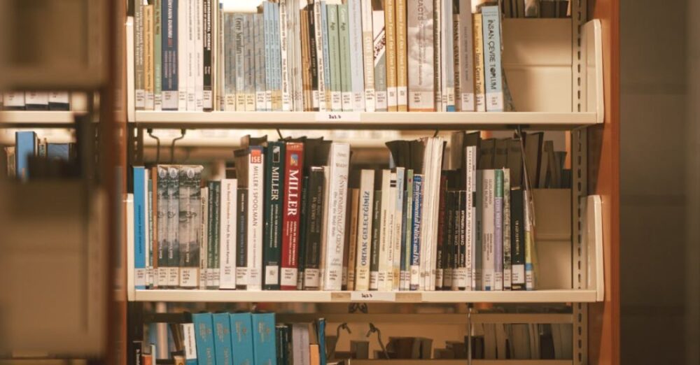 Lifelong Learning - A book shelf with books in it in a library