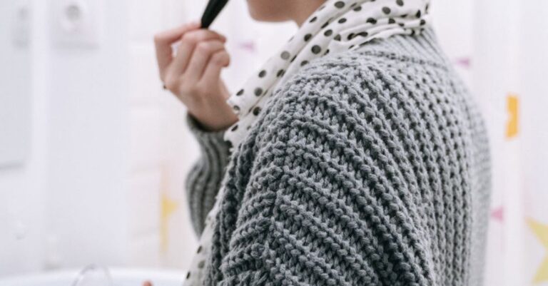 Genetic Research - Person in Gray Knit Sweater Holding Black Microphone