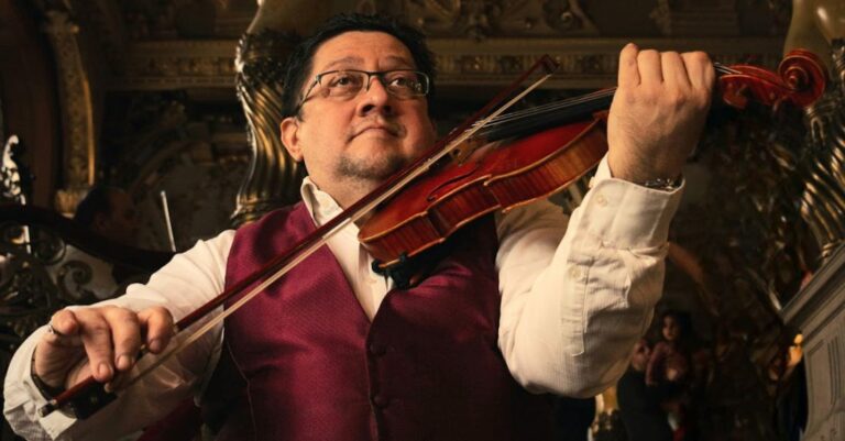 Art And Music - A man in a vest and bow tie playing the violin